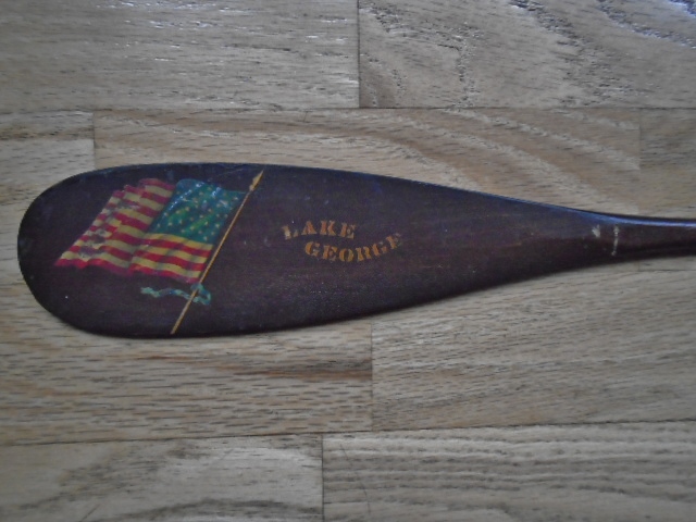 SMALL CANOE PADDLE WITH FLAG